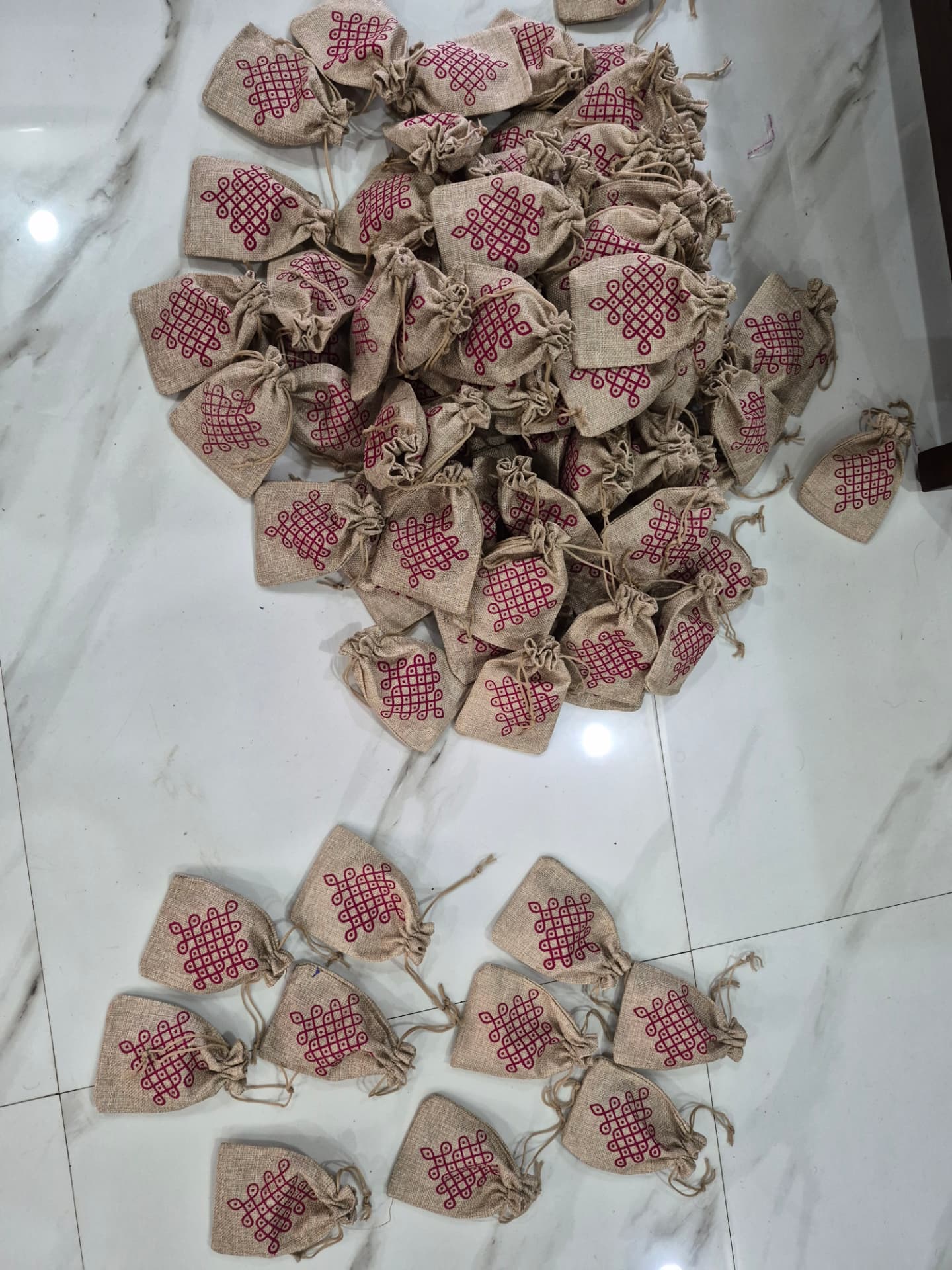 100 Kolam String Jute Bags with Magnets & Key Chains — Marriage Return Gift — Bulk Order | Kolam with Meenal bulk order